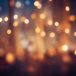 blurry image of lights and candles on a window