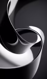 an abstract photo of two shiny metal objects