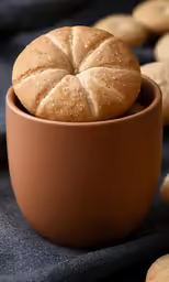 a bowl with some very tasty looking bread in it