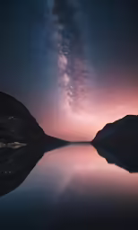 the sky is filled with stars above water