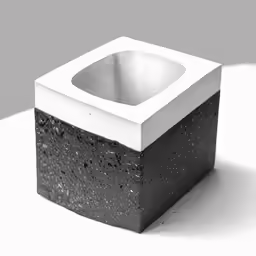 a white square shape sitting on top of a table