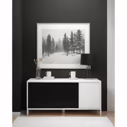 a photograph hanging on the wall next to a tv