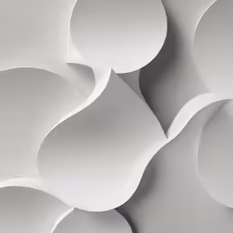 some round shapes with white paper on top