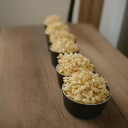 a close up view of some tiny food in bowls