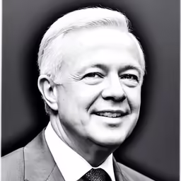 a close up of a person wearing a suit and tie