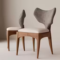 two modern chairs made out of wood with white cushions