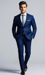 a man in a suit posing for a photograph