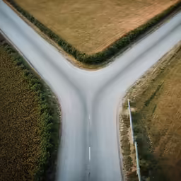 two roads are shaped into three intersecting areas
