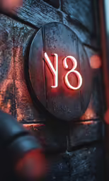 the number 3 on a black wall with orange lights