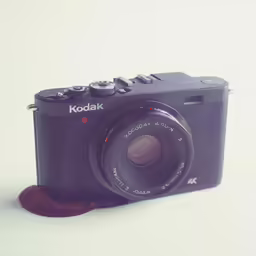 a camera with an empty lens next to it