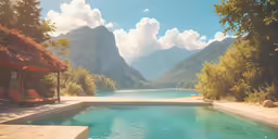 an empty pool near a wooded area with water running along it