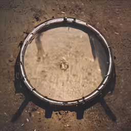 an animal paw is seen in the middle of a metal ring