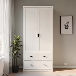 there is a very clean white cabinet next to the window