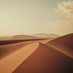 an open desert area with some sand dunes