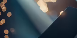 a table and some blurry lights with a black frame