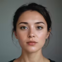 a woman has an artistic makeup look with white make - up