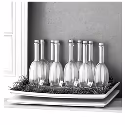 six empty liquor bottles sit next to each other