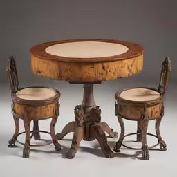 a small wooden table with two chairs around it