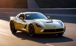 a yellow sports car on the road near the bridge