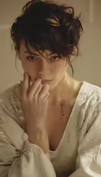 the woman has dark hair and no clothes