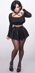 a woman in tight black pants posing with her hand on the head