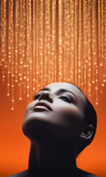a woman looks upward while she is in front of a backdrop of falling gold lights