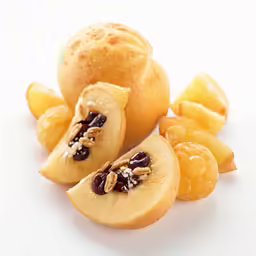 a picture of some fruits and nuts on the table