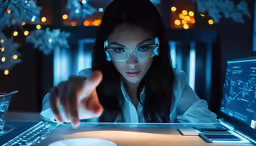 a young woman is staring at a laptop screen