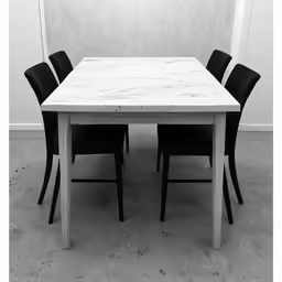 a table with five chairs and an unfinished frame