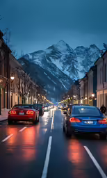some cars on a city street with a mountain in the background
