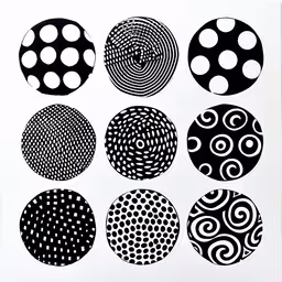 a bunch of black and white balls are shown,six circular design printes in various shapes