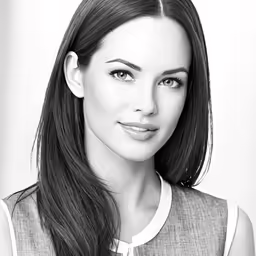a young girl posing for the camera in a black and white photo