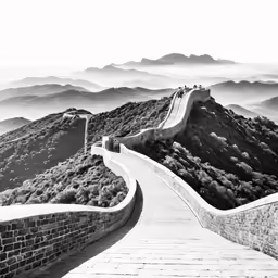 a walkway in the mountains is shown with the mountains in the background
