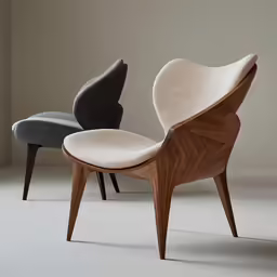 two modern chairs, one with an upholstered design