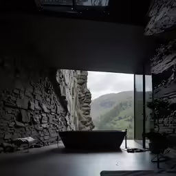 a room with a large tub sitting in the middle of it