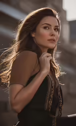 an attractive woman in a black dress posing for a photo
