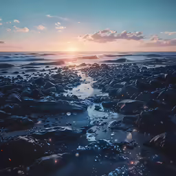 an ocean beach with some rocks and water