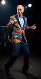 a man is dancing on the runway at the show
