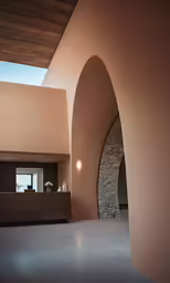 the walls of a room with a large fireplace