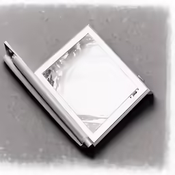 a small square picture frame on a card and a pen