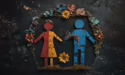 two people with their hands around a wreath of flowers