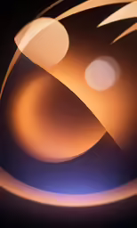 a close up of a cell phone on a black background