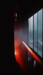 a view of the outside of an airplane window at night
