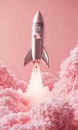 a space shuttle flying through the sky with its landing gear spinning away