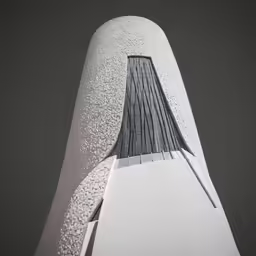 the top of an architectural skyscraper in the rain
