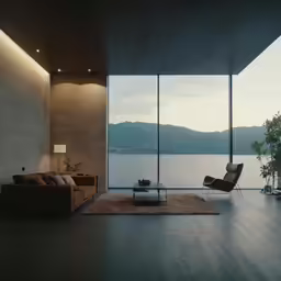 the large windows are looking out at the water
