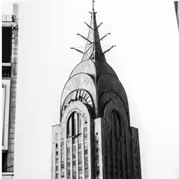 a very tall cathedral standing in the middle of a city
