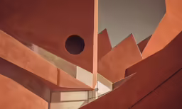 a view up into the middle of some concrete architecture