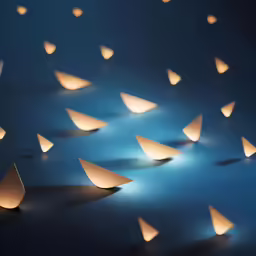 a pattern of paper candles siting against a blue background