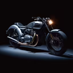 a silver motorcycle on a black background, with light behind